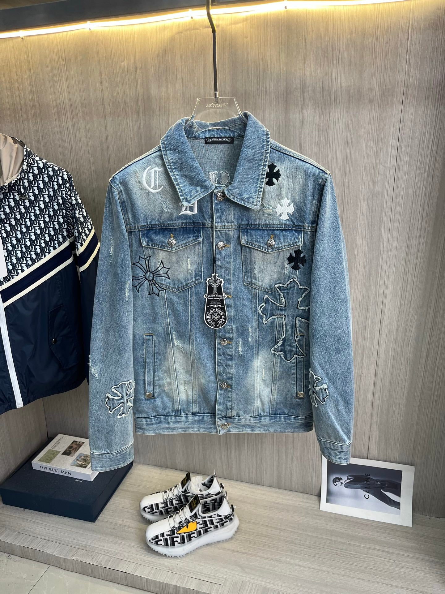 Light blue denim jacket with cross and flower patches