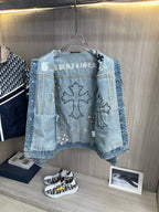 Light blue denim jacket front with cross and flower patches