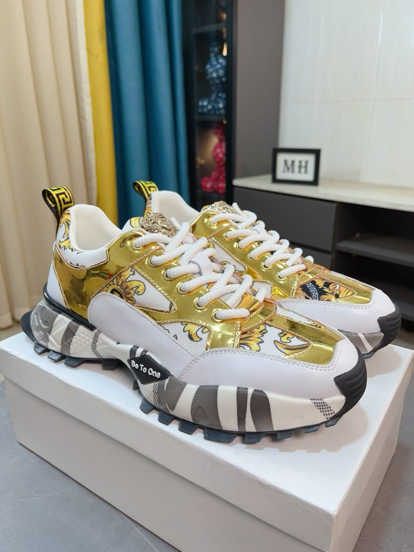 Versace chunky sneakers, gold foil look with white laces and patterned midsole