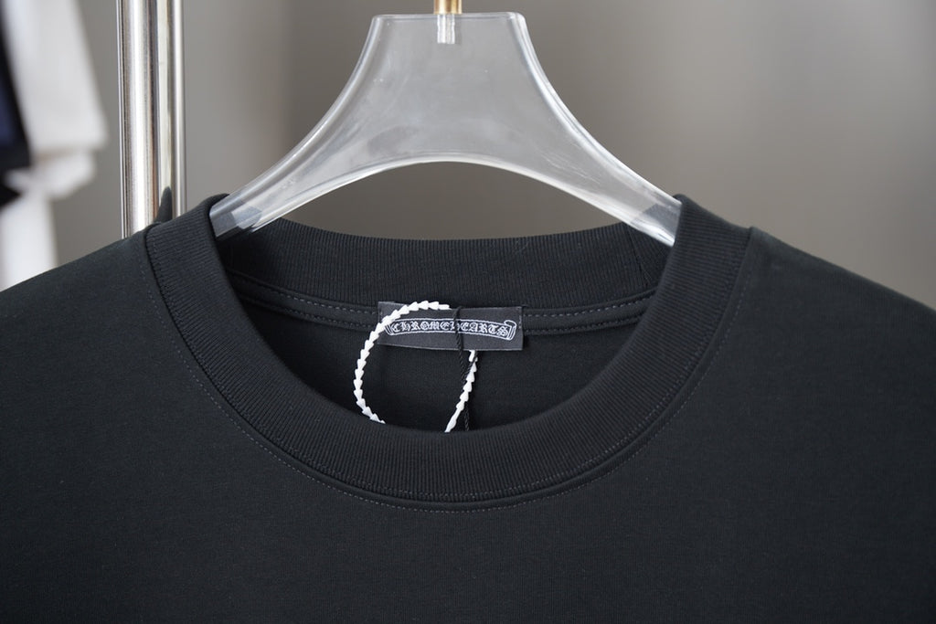 Black crewneck T-shirt collar with branded neck label