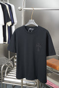 Black short-sleeve T-shirt with small dark graphic logo on chest
