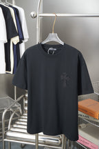 Black short-sleeve T-shirt with small dark graphic logo on chest