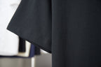 Black T-shirt with short sleeves and neat hem stitching