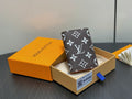 Monogram small wallet with dark brown fabric and white pattern, in gift box