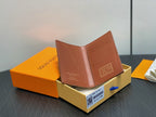 Small wallet in brown leather with stitched logo patch on front