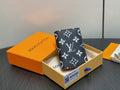 Small wallet in dark navy with white monogram floral pattern