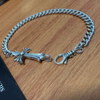 Silver-tone cross charm bracelet with chunky chain and ring clasp