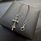 Silver-tone chain bracelet with cross pendant and ring clasp