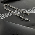 Silver-tone chain bracelet with cross charm and ring clasp