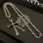 Silver-tone cross pendant necklace with chunky chain on gift box