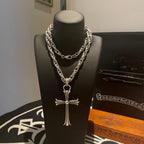 Silver-tone cross necklace on chain, front view with pendant detail