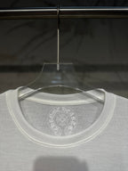 White long-sleeve shirt neckline with circular back logo print.