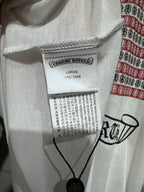 Long-sleeve graphic shirt size label and barcode tag near the collar