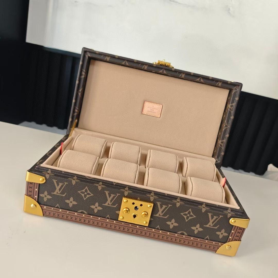 Monogram travel bag with open lid and beige organizer compartments