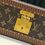 Louis Vuitton monogram trunk bag lock plate with gold tone keyhole and studs