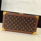 Louis Vuitton monogram trunk bag front panel with gold corner pieces and brown trim