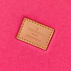 Louis Vuitton Paris France leather label on bright pink lining