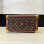 Louis Vuitton monogram trunk case, front view with gold corner fittings and clasp