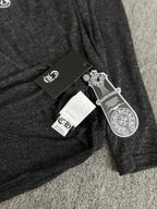 Long-sleeve T-shirt with attached hang tags on dark heather gray fabric