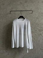 White long-sleeve crewneck shirt with large chest graphic, laid flat on hanger.