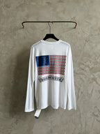 White long-sleeve shirt with front graphic featuring striped pattern and band logo.