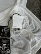 White long-sleeve top, interior neck label and hang tag
