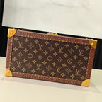 Louis Vuitton monogram trunk bag, front view, with gold corner caps and clasp