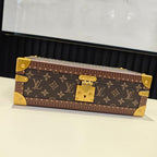 Louis Vuitton monogram trunk bag, closed, with gold hardware and brass latch