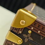 Louis Vuitton monogram trunk bag corner hinge with gold metal cap