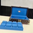 Louis Vuitton monogram trunk bag open with blue insert tray and gold hardware