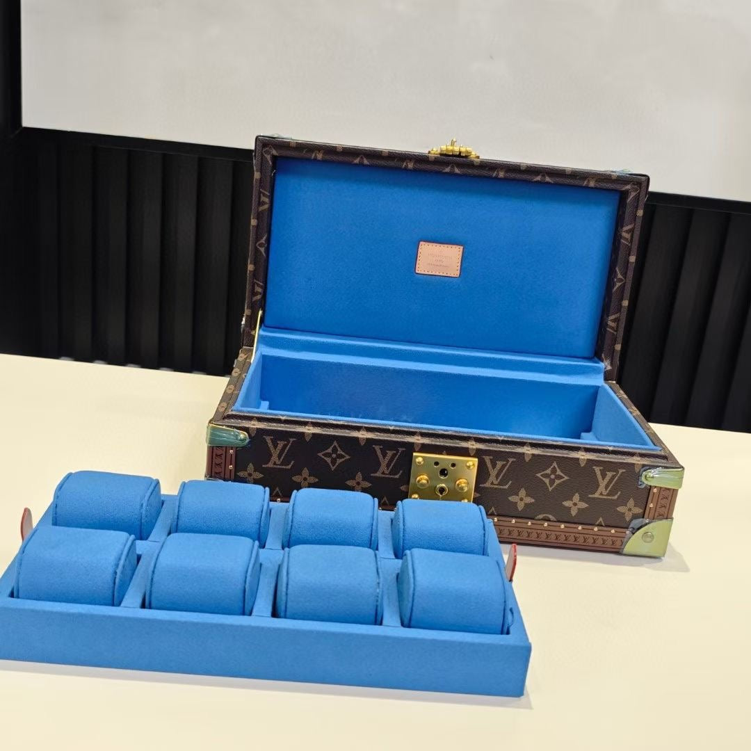 Louis Vuitton monogram trunk bag open with blue insert tray and gold hardware