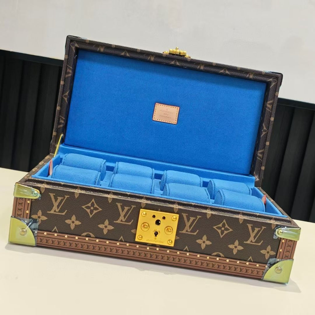 Louis Vuitton monogram trunk bag with blue interior lining and gold corner hardware