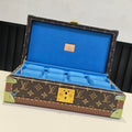 Louis Vuitton monogram trunk bag with blue interior lining and gold corner hardware