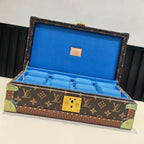 Louis Vuitton monogram trunk bag with blue interior lining and gold corner hardware