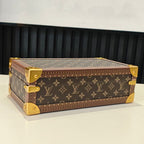 Louis Vuitton monogram trunk bag with gold trim and corner studs, closed