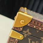Louis Vuitton monogram trunk bag gold corner hinge detail with engraved plate