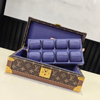 Louis Vuitton monogram trunk bag with blue compartments, open lid on display