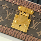 Louis Vuitton trunk bag gold lock plate and hardware on monogram canvas
