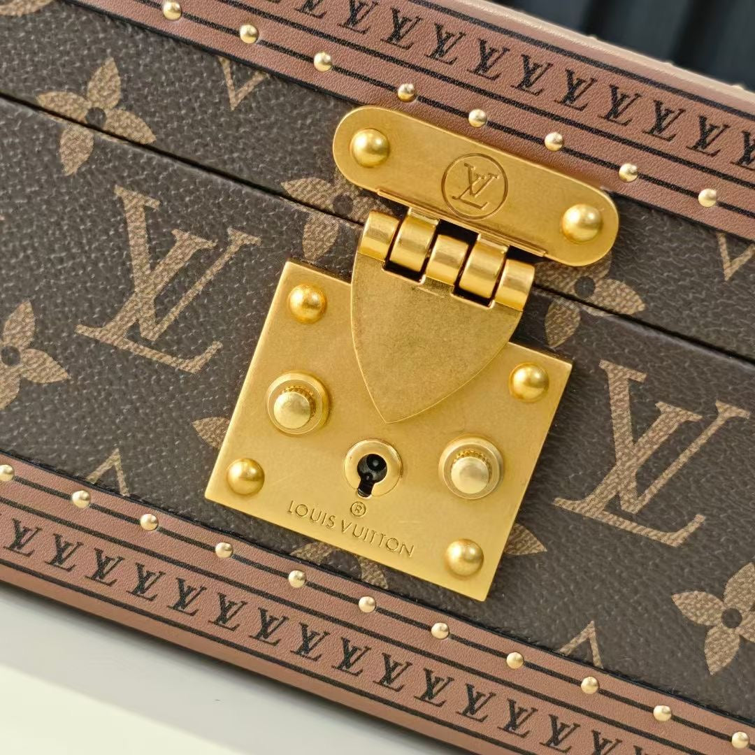 Louis Vuitton trunk bag gold lock plate and hardware on monogram canvas