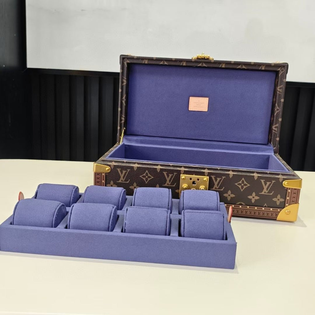 Louis Vuitton trunk bag with blue velvet compartments, open lid and organizer