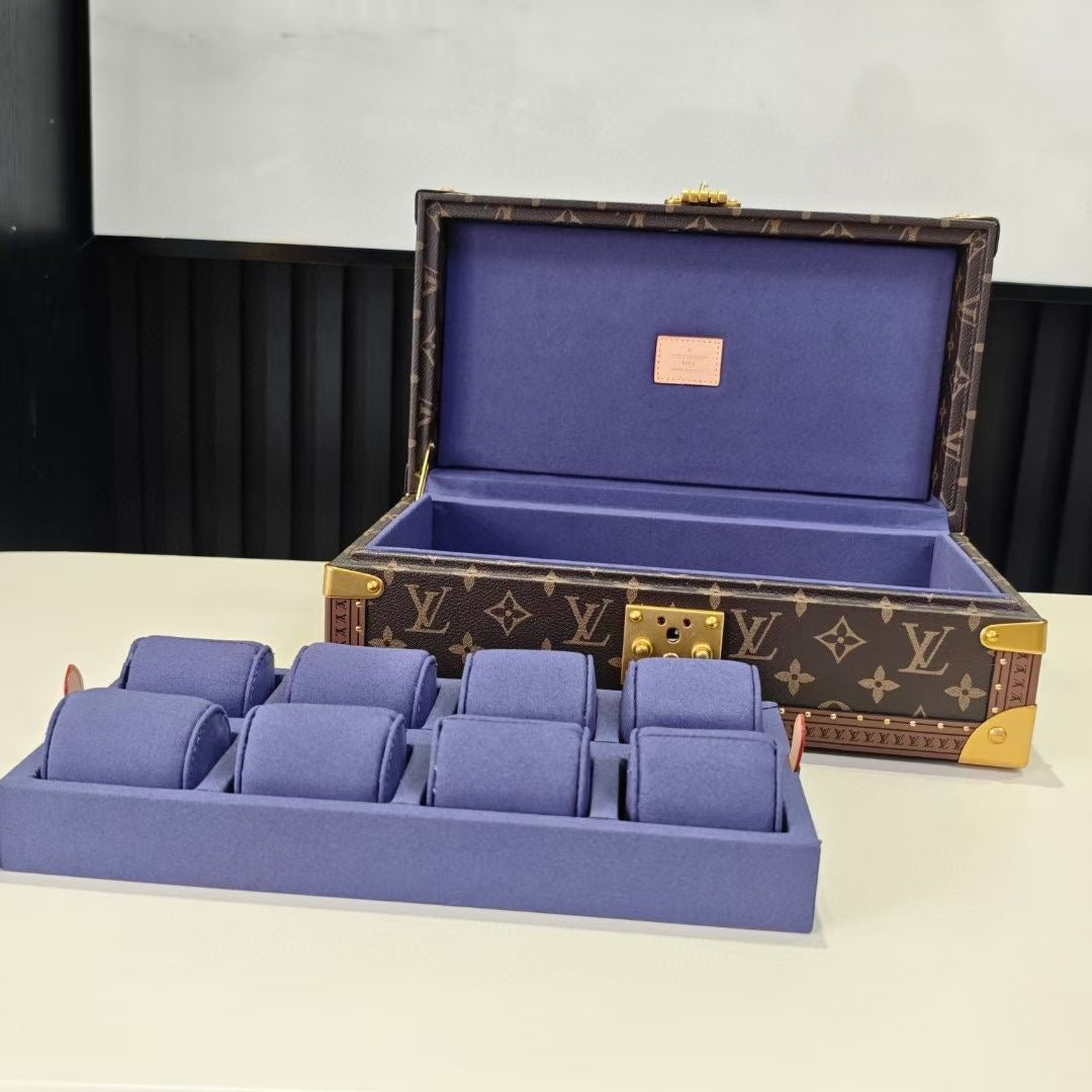 Louis Vuitton trunk bag with blue velvet compartments, open lid and organizer