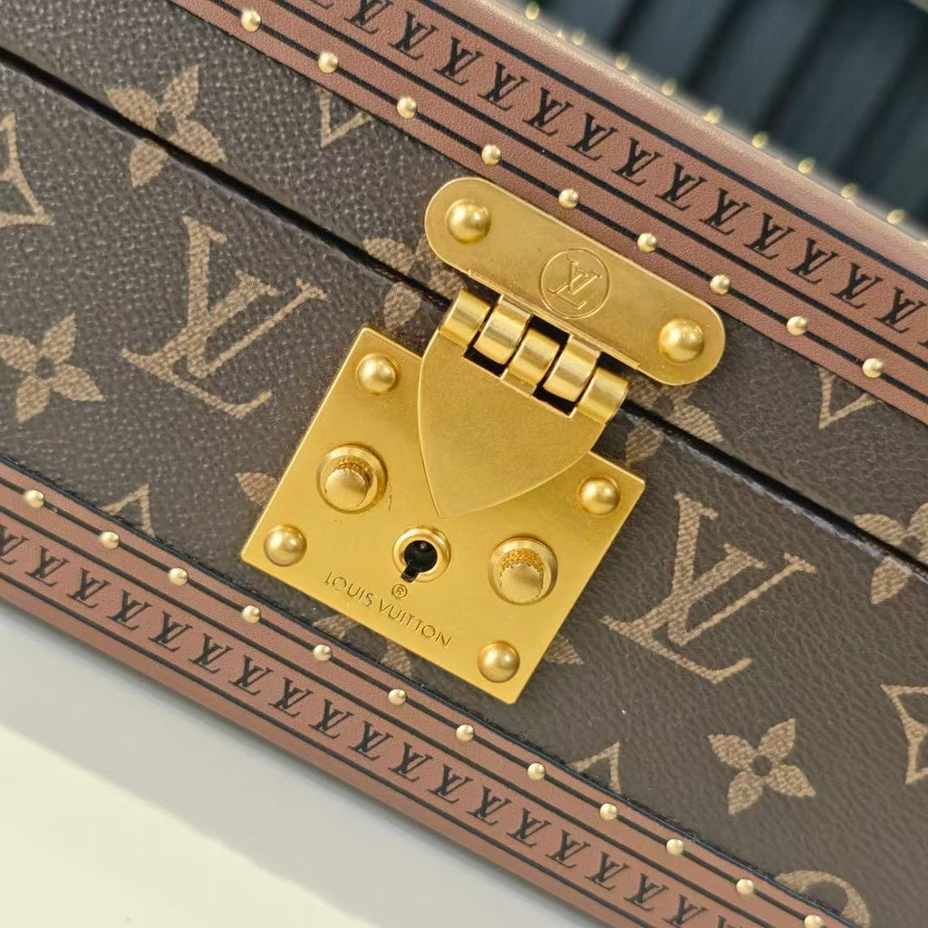 Louis Vuitton monogram trunk lock plate with gold hardware