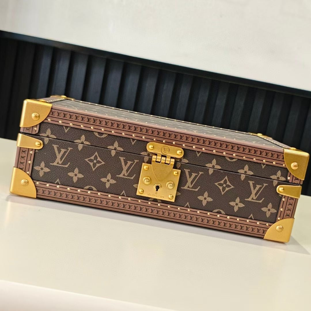Louis Vuitton monogram trunk with gold hardware, closed