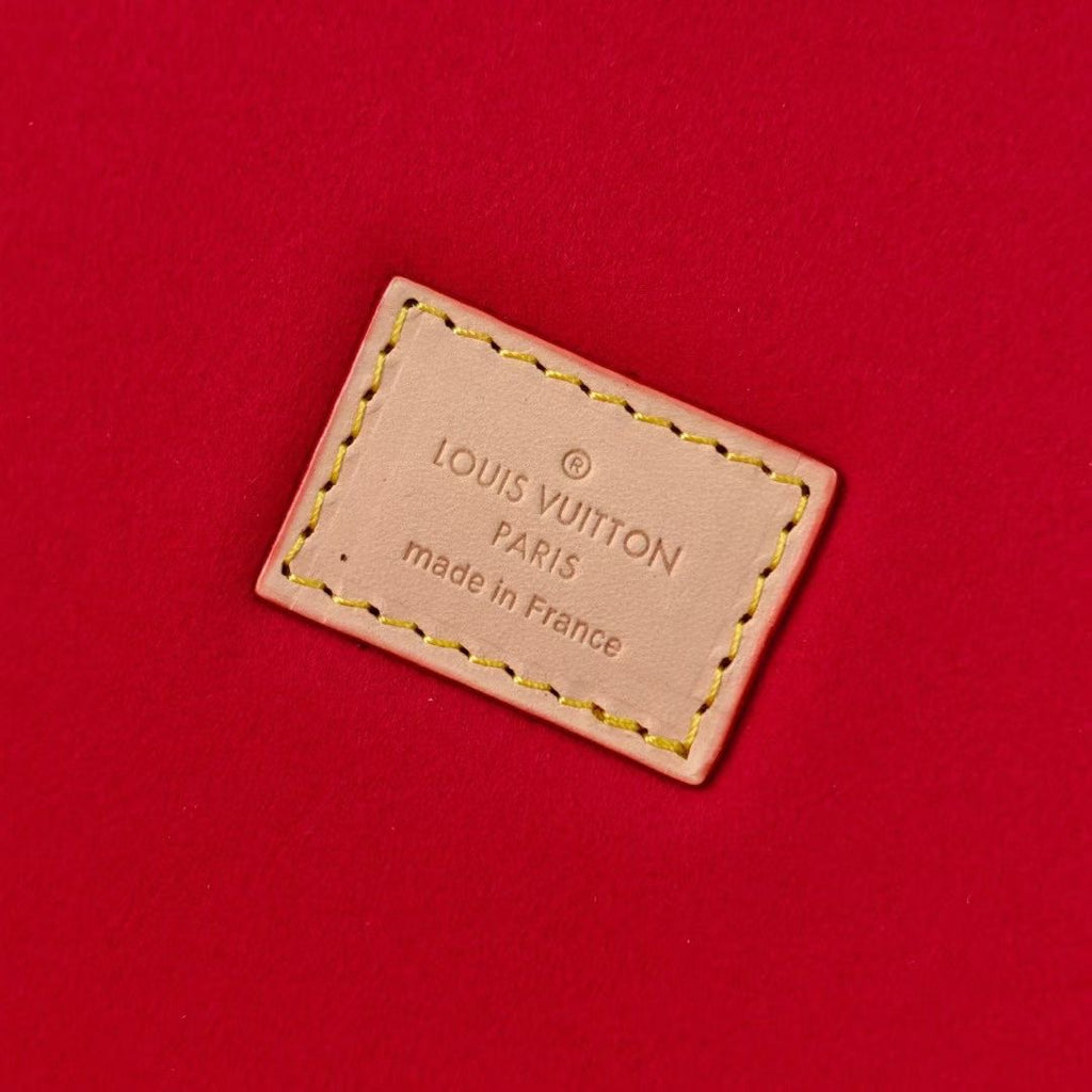 Louis Vuitton Paris label on red lining, made in France