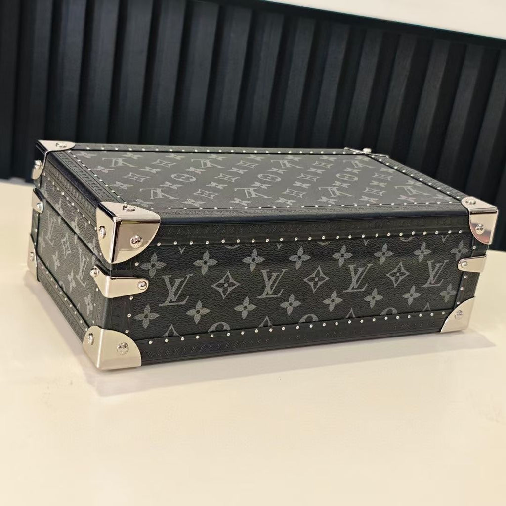Louis Vuitton monogram storage trunk, front view with studs and metal clasps