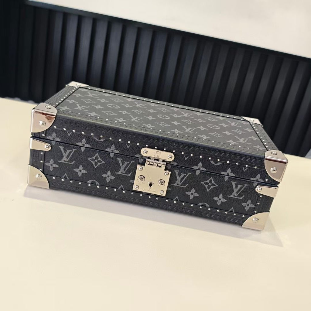 Louis Vuitton monogram storage trunk, closed with metal corners and lock