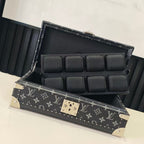 Louis Vuitton monogram storage trunk with open lid and black padded insert