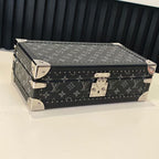 Louis Vuitton monogram storage trunk, top view with metal corner hardware and latch