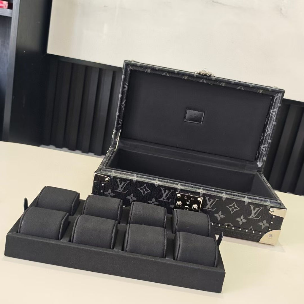 Louis Vuitton monogram storage trunk with open lid and black divider tray