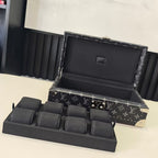 Louis Vuitton monogram storage trunk with open lid and black divider tray